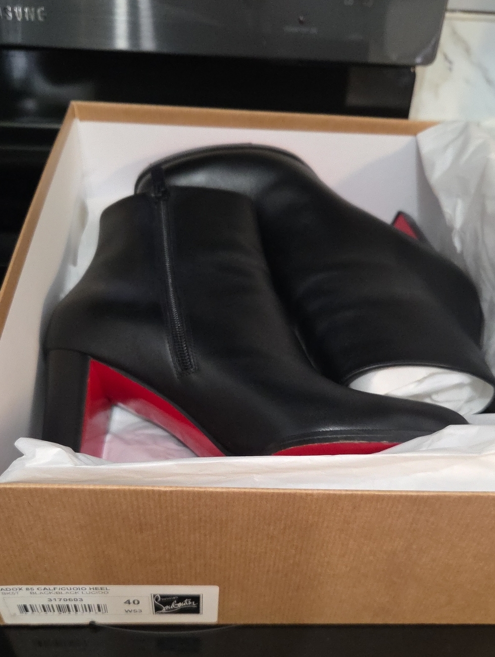 Christian Louboutin Black Leather Ankle Booties with Red Sole